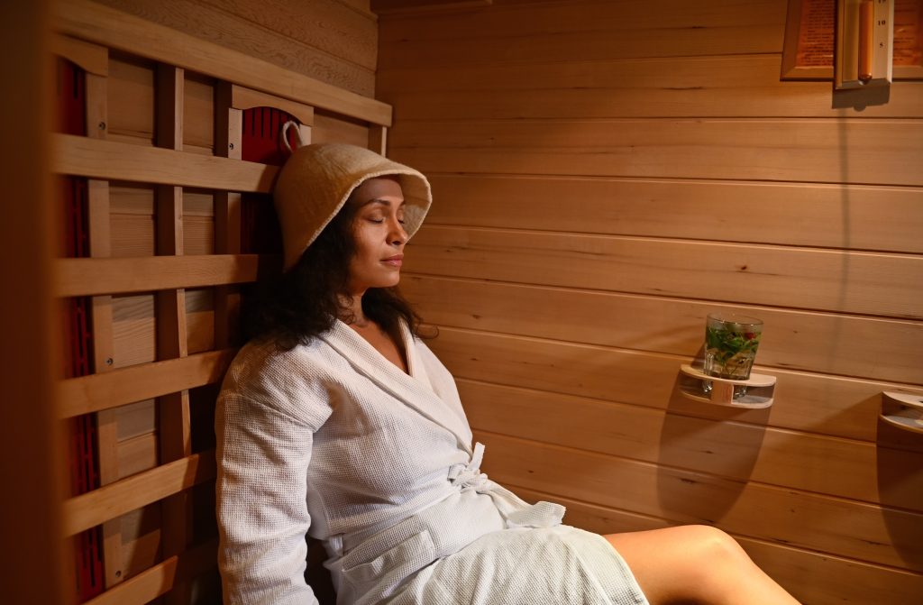 woman in sauna relazxing